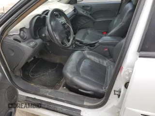 2004 Pontiac Grand Am GT with VIN 1G2NW52E84C154801, listed as a Copart auction lot 44636355 with 168,862 mi miles and Salvage Title. Bid and sale history available at carsss.com. Image 7.