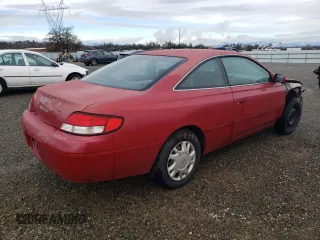 2000 Toyota Solara SE with VIN 2T1CG22P9YC375675, listed as a Copart auction lot 86199014 with 168,998 mi miles and Salvage Title. Bid and sale history available at carsss.com. Image 3.