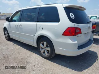 2011 Volkswagen Routan SE with VIN 2V4RW3DG3BR641964, listed as a IAAI auction lot 42758818 with 119,247 mi miles and . Bid and sale history available at DreamBid. Image 3.