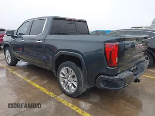 2020 GMC Sierra 1500 Denali z VIN 1GTU9FEL1LZ120581, wystawiony jako IAAI lot #41428827 z przebiegiem 97 917 mil mil oraz . Historia ofert i sprzedaży dostępna na DreamBid. Obrazek 3.