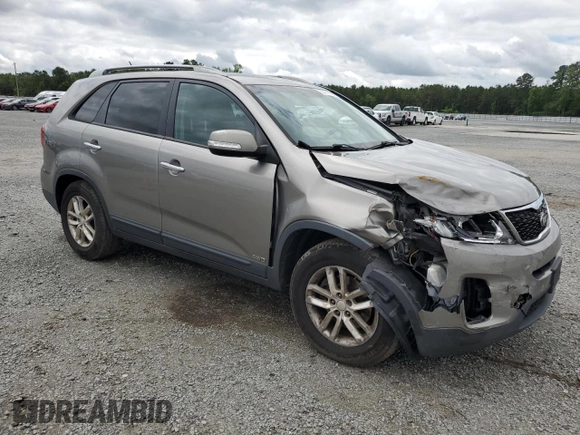 2015 Kia Sorento LX with VIN 5XYKTCA68FG651349, listed as a Copart auction lot 58441095 with 218,027 mi miles and Salvage title. Bid and sale history available at DreamBid. Image 4.