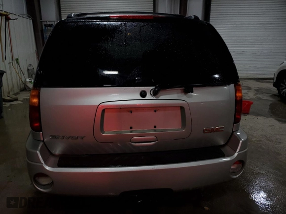 2007 GMC Envoy SLT with VIN 1GKDT13S572310014, listed as a Copart auction lot 44322845 with 152,489 mi miles and Salvage Title. Bid and sale history available at carsss.com. Image 6.