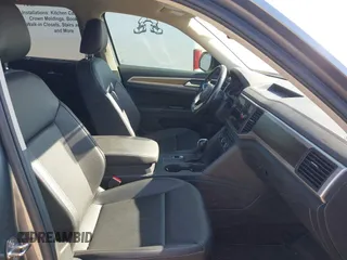 2021 Volkswagen Atlas SE z VIN 1V2DP2CA3MC518670, wystawiony jako IAAI lot #41860811 z przebiegiem 69 270 mil mil oraz . Historia ofert i sprzedaży dostępna na DreamBid. Obrazek 5.