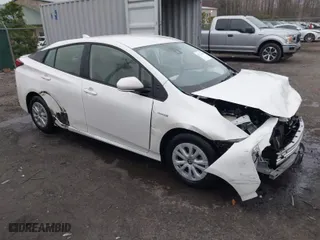 2019 Toyota Prius L Eco with VIN JTDKARFU8K3081187, listed as a IAAI auction lot 41771346 with 64,864 mi miles. Bid and sale history available at carsss.com. Image 1.