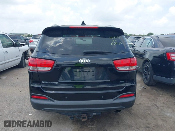 2016 Kia Sorento LX z VIN 5XYPGDA50GG112670, wystawiony jako IAAI lot #42170870 z przebiegiem 165 053 mil mil oraz . Historia ofert i sprzedaży dostępna na DreamBid. Obrazek 16.