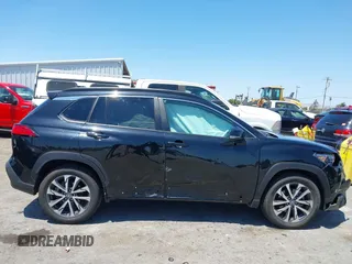 2022 Toyota Corolla Cross XLE with VIN 7MUEAABG3NV042742, listed as a IAAI auction lot 42595052 with 54,299 mi miles and . Bid and sale history available at DreamBid. Image 6.