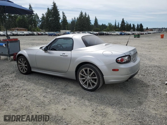 2008 Mazda MX-5 Miata Touring with VIN JM1NC26F780146072, listed as a Copart auction lot 65602695 with 124,607 mi miles and Salvage title. Bid and sale history available at DreamBid. Image 2.