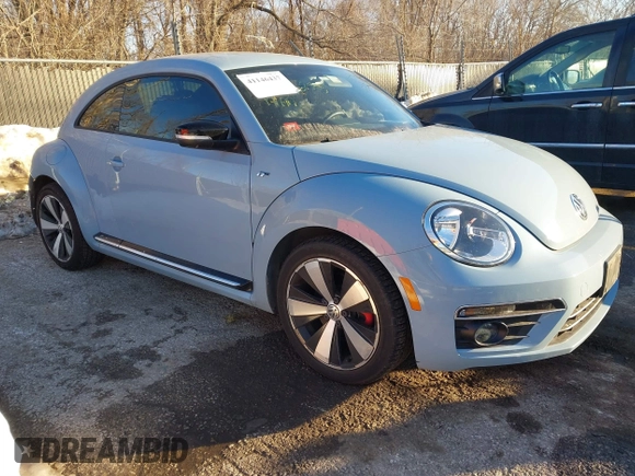 2014 Volkswagen Beetle Turbo R-Line with VIN 3VWVT7AT9EM661347, listed as a IAAI auction lot 41336295 with 61,068 mi miles and . Bid and sale history available at DreamBid. Image 1.