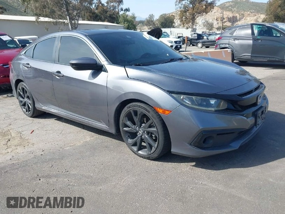 2019 Honda Civic Sedan Sport with VIN 2HGFC2F8XKH557203, listed as a IAAI auction lot 41846429 with 105,598 mi miles. Bid and sale history available at carsss.com. Image 1.