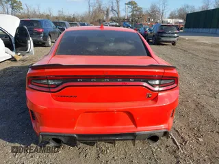 2022 Dodge Charger Scat Pack Widebody with VIN 2C3CDXGJ3NH101081, listed as a IAAI auction lot 41351466 with 9,575 mi miles and . Bid and sale history available at DreamBid. Image 16.