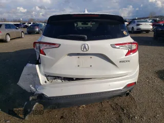 2020 Acura RDX w/Advance Pkg with VIN 5J8TC1H73LL001062, listed as a Copart auction lot 87315834 with 77,103 mi miles and Salvage Title. Bid and sale history available at carsss.com. Image 6.