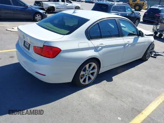 2014 BMW 3 Series 320i with VIN WBA3B1C50EK135458, listed as a IAAI auction lot 41631722 with 1 mi miles. Bid and sale history available at carsss.com. Image 4.