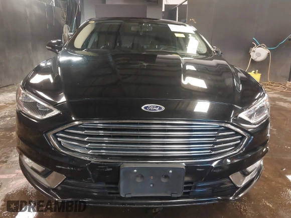2017 Ford Fusion Titanium with VIN 3FA6P0D93HR197617, listed as a IAAI auction lot 41673022 with 65,041 mi miles and . Bid and sale history available at DreamBid. Image 12.