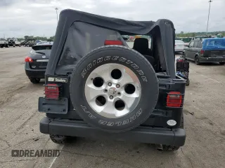 2005 Jeep Wrangler Unlimited with VIN 1J4FA44S75P358246, listed as a Copart auction lot 60958695 with 150,003 mi miles and Salvage title. Bid and sale history available at DreamBid. Image 6.