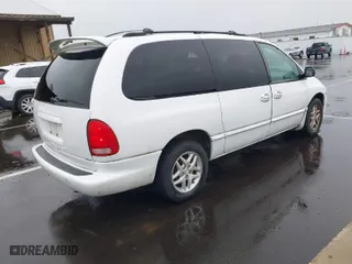 1999 Dodge Caravan SE with VIN 2B4GP44GXXR285795, listed as a IAAI auction lot 41850278 with 2,552,594 mi miles. Bid and sale history available at carsss.com. Image 4.