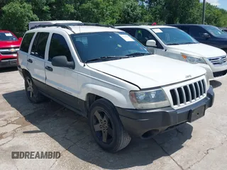 2004 Jeep Grand Cherokee Laredo z VIN 1J4GX48S74C152542, wystawiony jako IAAI lot #42350507 z przebiegiem 176 366 mil mil oraz . Historia ofert i sprzedaży dostępna na DreamBid. Obrazek 1.