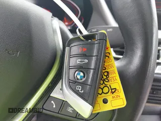 2021 BMW 2 Series 228i xDrive z VIN WBA73AK09M7G52220, wystawiony jako IAAI lot #42403680 z przebiegiem 72 407 mil mil oraz . Historia ofert i sprzedaży dostępna na DreamBid. Obrazek 11.