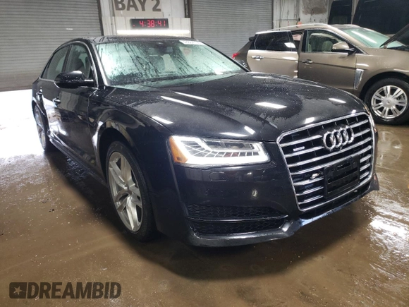 2017 Audi A8 z VIN WAU44AFD2HN014533, wystawiony jako Copart lot #46684705 z przebiegiem 94 030 mil mil oraz Szkody całkowita. Historia ofert i sprzedaży dostępna na DreamBid. Obrazek 4.