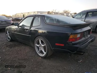 1986 Porsche 944 with VIN WP0AA0951GN156691, listed as a Copart auction lot 79901794 with 694,360 mi miles and Salvage Title. Bid and sale history available at DreamBid. Image 2.