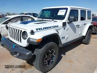 2023 Jeep Wrangler Rubicon with VIN 1C4JJXR63PW580370, listed as a IAAI auction lot 42017282 with 31,823 mi miles and . Bid and sale history available at DreamBid. Image 2.