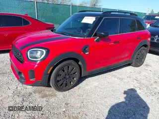 2023 MINI Countryman Cooper S z VIN WMZ83BR03P3R02336, wystawiony jako IAAI lot #41943111 z przebiegiem 22 784 mil mil oraz . Historia ofert i sprzedaży dostępna na DreamBid. Obrazek 2.