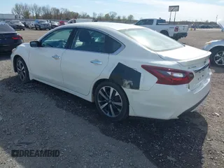 2017 Nissan Altima SV with VIN 1N4AL3AP6HC281066, listed as a IAAI auction lot 41863874 with 131,063 mi miles and . Bid and sale history available at DreamBid. Image 3.