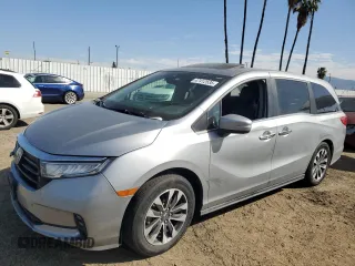 2021 Honda Odyssey EX-L with VIN 5FNRL6H77MB011099, listed as a Copart auction lot 47412535 with 148,004 mi miles and Salvage Title. Bid and sale history available at DreamBid. Image 1.