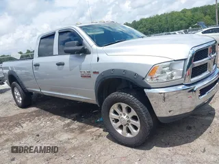 2016 Ram 2500 Tradesman z VIN 3C6UR5HJ9GG264459, wystawiony jako IAAI lot #42474269 z przebiegiem 199 961 mil mil oraz . Historia ofert i sprzedaży dostępna na DreamBid. Obrazek 1.