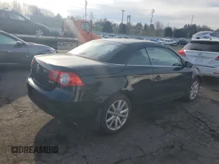 2009 Volkswagen Eos Komfort with VIN WVWBA71F19V021652, listed as a Copart auction lot 88701675 with 171,298 mi miles and Salvage Title. Bid and sale history available at DreamBid. Image 3.