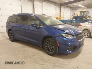 2021 Chrysler Pacifica Touring L with VIN 2C4RC3BGXMR541417, listed as a IAAI auction lot 42029959 with 63,288 mi miles and . Bid and sale history available at DreamBid. Image 1.