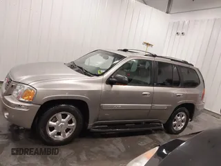 2003 GMC Envoy SLT with VIN 1GKDT13S932395367, listed as a IAAI auction lot 41544810 with 142,012 mi miles. Bid and sale history available at carsss.com. Image 13.