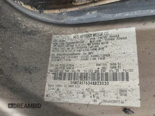 2004 Ford Freestar SES z VIN 2FMZA57634BB23030, wystawiony jako IAAI lot #41794742 z przebiegiem Nie podano mil oraz . Historia ofert i sprzedaży dostępna na DreamBid. Obrazek 9.