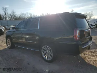 2016 GMC Yukon XL Denali with VIN 1GKS1HKJXGR443700, listed as a Copart auction lot 85327284 with 115,015 mi miles and Salvage Title. Bid and sale history available at carsss.com. Image 2.