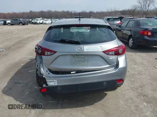 2015 Mazda 3 i Touring with VIN 3MZBM1L77FM138326, listed as a IAAI auction lot 41839685 with 97,506 mi miles and . Bid and sale history available at carsss.com. Image 16.