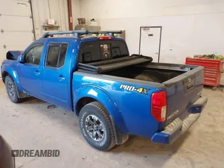 2015 Nissan Frontier SV with VIN 1N6AD0EV4FN709892, listed as a IAAI auction lot 42473594 with 153,103 mi miles and . Bid and sale history available at DreamBid. Image 3.