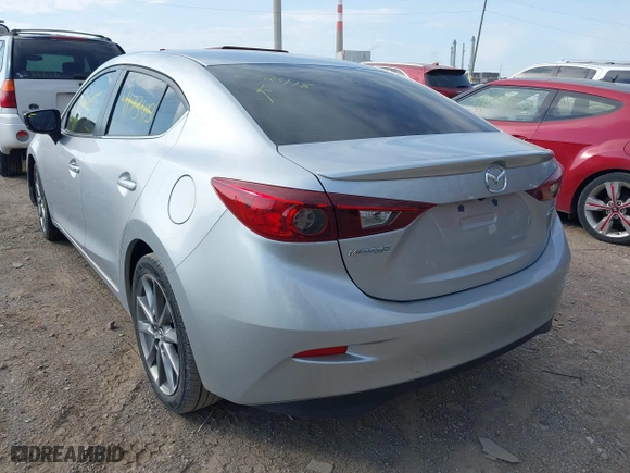 2018 Mazda Mazda3 4-Door Touring with VIN 3MZBN1V37JM262418, listed as a IAAI auction lot 41880212 with 118,662 mi miles. Bid and sale history available at carsss.com. Image 3.