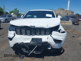 2021 Jeep Grand Cherokee Laredo X with VIN 1C4RJFAG6MC759825, listed as a IAAI auction lot 42281301 with 47,417 mi miles and . Bid and sale history available at DreamBid. Image 6.