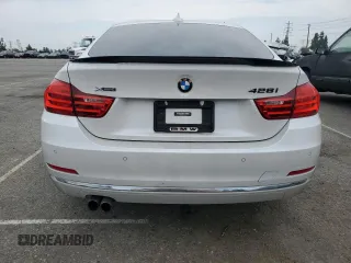 2015 BMW 4 Series 428i xDrive with VIN WBA4C9C59FD331372, listed as a Copart auction lot 58628665 with 81,245 mi miles and Salvage title. Bid and sale history available at DreamBid. Image 6.