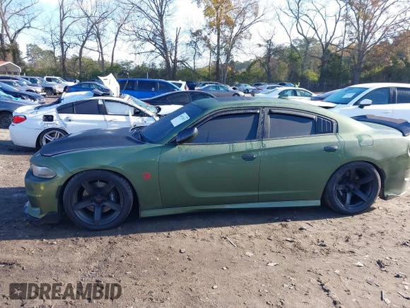 2019 Dodge Charger Scat Pack with VIN 2C3CDXGJ4KH572619, listed as a IAAI auction lot 40973015 with 40,148 mi miles and . Bid and sale history available at DreamBid. Image 14.