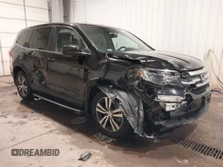 2018 Honda Pilot EX-L z VIN 5FNYF6H82JB014516, wystawiony jako IAAI lot #41615682 z przebiegiem 87 067 mil mil oraz . Historia ofert i sprzedaży dostępna na DreamBid. Obrazek 1.