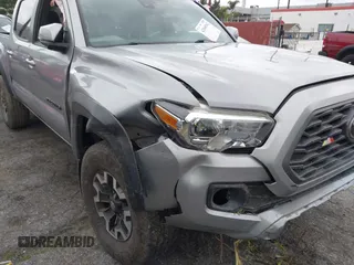 2021 Toyota Tacoma SR z VIN 3TMCZ5AN3MM374132, wystawiony jako IAAI lot #42068562 z przebiegiem 38 654 mil mil oraz . Historia ofert i sprzedaży dostępna na DreamBid. Obrazek 20.
