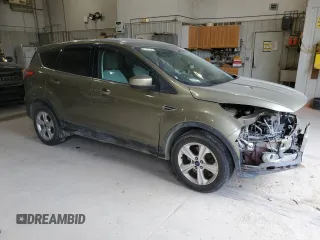 2014 Ford Escape SE with VIN 1FMCU9GX6EUB26142, listed as a Copart auction lot 51046405 with 131,032 mi miles and Salvage Title. Bid and sale history available at carsss.com. Image 4.