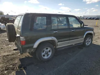 2001 Isuzu Trooper S z VIN JACDJ58XX17J02121, wystawiony jako Copart lot #77664704 z przebiegiem 148 752 mil mil oraz Szkody całkowita. Historia ofert i sprzedaży dostępna na DreamBid. Obrazek 3.