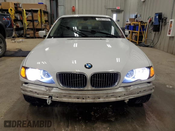 2004 BMW 3 Series 330xi with VIN WBAEW53474PG10944, listed as a Copart auction lot 52017375 with 216,654 mi miles and Clean Title. Bid and sale history available at carsss.com. Image 5.