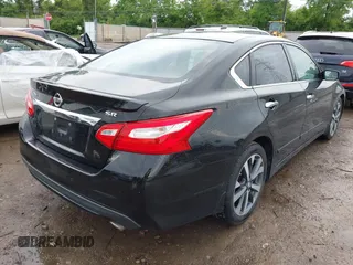 2016 Nissan Altima SR with VIN 1N4AL3AP2GC128229, listed as a IAAI auction lot 42317188 with 153,230 mi miles and . Bid and sale history available at DreamBid. Image 4.