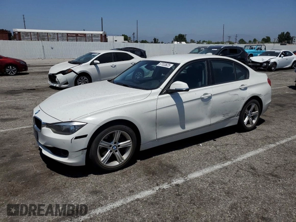 2015 BMW 3 Series 328i with VIN WBA3C1C56FK122177, listed as a Copart auction lot 57333625 with 102,399 mi miles and Salvage title. Bid and sale history available at DreamBid. Image 1.