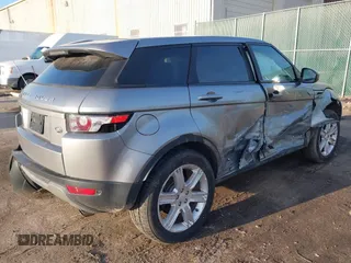 2014 Land Rover Range Rover Evoque Pure Plus z VIN SALVP2BG0EH863440, wystawiony jako IAAI lot #41760065 z przebiegiem 136 997 mil mil oraz . Historia ofert i sprzedaży dostępna na DreamBid. Obrazek 4.