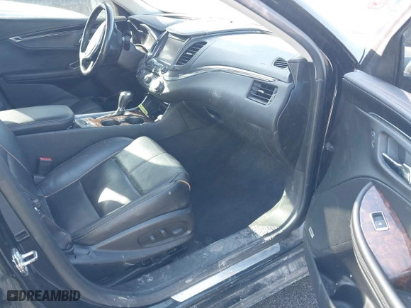 2014 Chevrolet Impala LTZ with VIN 2G1155S31E9105694, listed as a IAAI auction lot 41414595 with 128,828 mi miles. Bid and sale history available at carsss.com. Image 5.