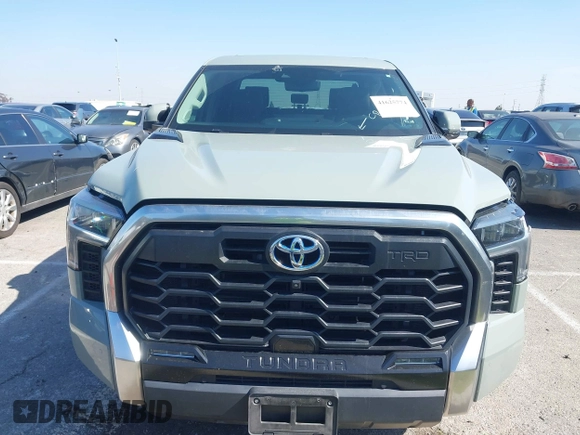 2022 Toyota Tundra Limited Hybrid with VIN 5TFJC5EC9NX001528, listed as a IAAI auction lot 41625774 with 57,475 mi miles and . Bid and sale history available at DreamBid. Image 12.