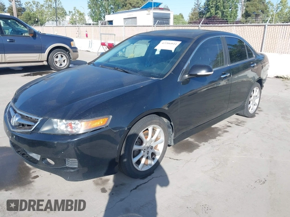 2006 Acura TSX Navi with VIN JH4CL969X6C014461, listed as a IAAI auction lot 42206844 with 119,201 mi miles and . Bid and sale history available at DreamBid. Image 2.